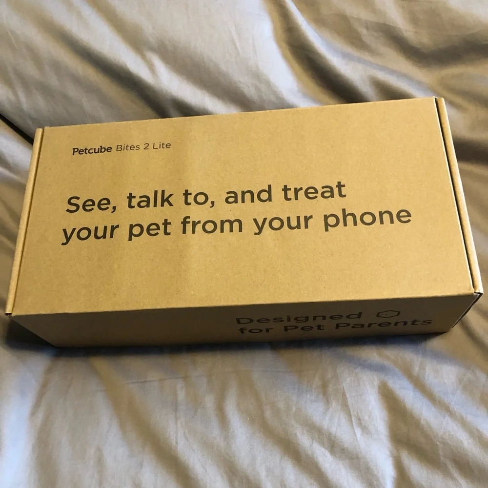 Automatic dog snack shooter and camera and voice interaction